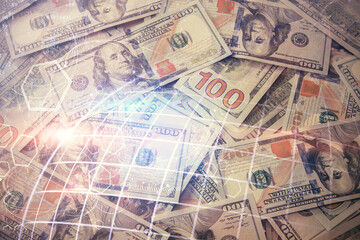 Double exposure of world map drawing over us dollars bill background. International concept.