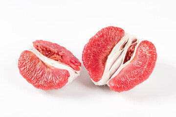 Fresh peeled red pomelo fruit isolated on white background