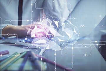 Multi exposure of woman hands working on computer and human brain hologram drawing. Ai tech concept.