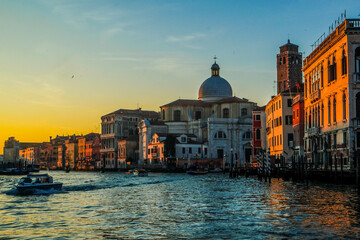 Fototapeta na wymiar On the vaporetto along the Grand Canal towards the center of Venice at sunset