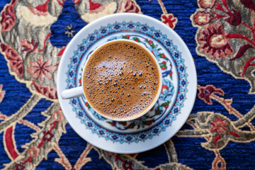Traditional Turkish coffee, Anatolian coffee, on the table at the old cafe in Turkey. Top view.