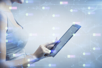 Double exposure of technology sketch hologram and woman holding and using a mobile device.