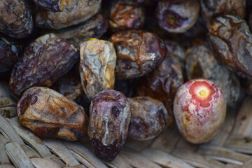 Dates fruit close up, fresh raw ripen sweet palm food Ramadan ingredient photo