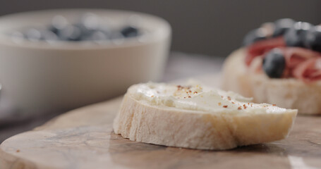 seasoning cream cheese on ciabatta