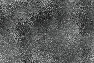 Gray stained glass, texture background of beautiful gray glass.