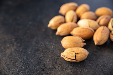 pecan nuts in shell fresh ingredient snack on the table copy space food background rustic vegan or vegetarian food