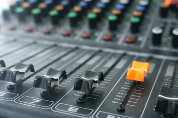 Sound and audio mixer console with buttons channel sliders.