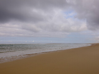 Big gray clouds on a beach in the Landes, near Moliets and Maa.