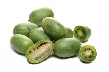 Hardy kiwi slice, Actinidia arguta isolated on white 