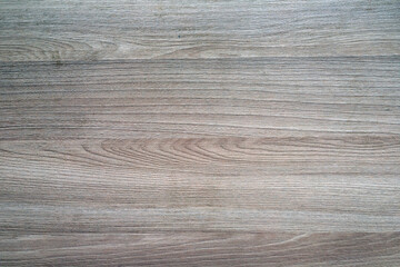 The grey wooden surface is professionally made and fitted. Floor, furniture, table, laminate, parquet.