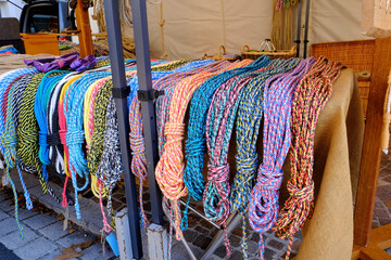 city center, artisans sell self-made goods, braided, twisted ropes, pulleys and other goods of...