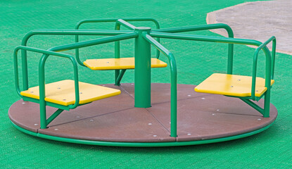 Steel carousel in children s playground