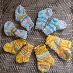 beautiful, variegated small children's socks, handmade, wool yarn, knitted texture