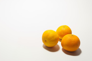 Ripe orange fresh mandarins isolated on the white background