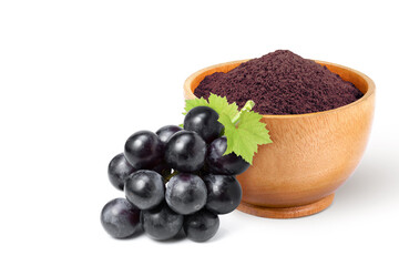 Grape extract flour (opc grape powder) in wooden bowl and fresh black grapes isolated on white...