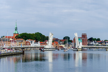 Obraz premium Kappeln, Germany - September 07, 2021: View of the bridge over the Schlei (Schleibrücke Kappeln) and city of Kappeln
