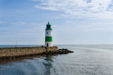 Obraz premium The Lighthouse of Schleimünde at Western coast of Baltic Sea marks the entrance from the sea into the Schlei. The beacon was built in 1871.