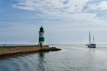 Obraz premium The Lighthouse of Schleimünde at Western coast of Baltic Sea marks the entrance from the sea into the Schlei. The beacon was built in 1871.