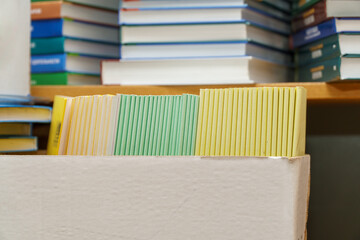 Books and brochures on a shelf in the library