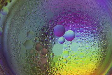Close view of oil bubble. Macro of colorful oil bubble. Beautiful background of oil bubble. 