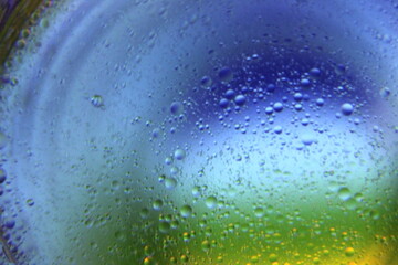Close view of oil bubble. Macro of colorful oil bubble. Beautiful background of oil bubble. 