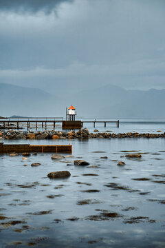 Valder&oslash;y ferry lighthouse on a rainy day, Norway