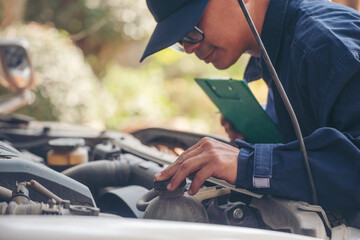 Mechanic car service auto garage in automotive mobile center. Technician workshop repair engine motor vehicles service mechanical engineering business. Automobile mechanic hands car repairs technic