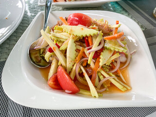 Mango spicy salad - Yam mamuang, Traditional thai cuisine .