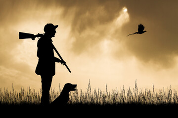 hunter with hunting dog at sunset - obrazy, fototapety, plakaty