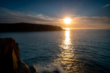 Acadia National Park, ME - USA - Oct. 13, 2021: Horizontal view of sunrise at Newport Cove in...