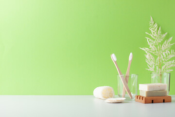 Zero waste, sustainable and eco-friendly lifestyle. Set of eco friendly natural cleaning products on green background. Close up, copy space. on green background. Close up, copy space