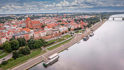 Aerial view of Torun old town and Jozef Pilsudski bridge. - obrazy, fototapety, plakaty
