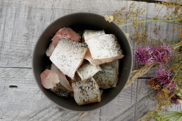 Cooking pike fish soup. Cooking food on a tourist burner. Traditional food angler or tourist. 