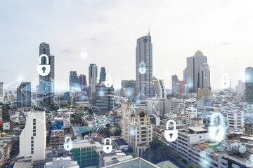 Fototapeta na wymiar Padlock icon hologram over panorama city view of Bangkok to protect business in Southeast Asia. The concept of information security shields. Double exposure.