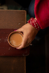 Woman's hand with chai 