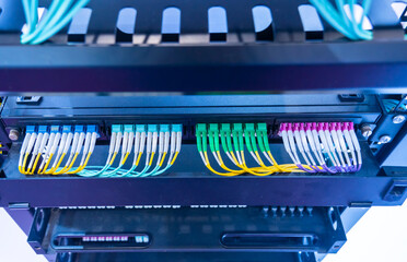 Fiber Optic cables connected to an optic ports