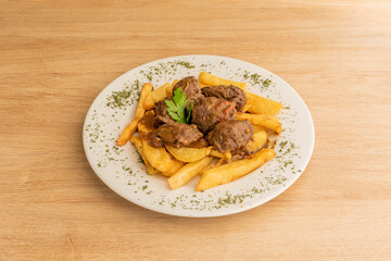typical Spanish recipe for beef cheek stew with homemade chips