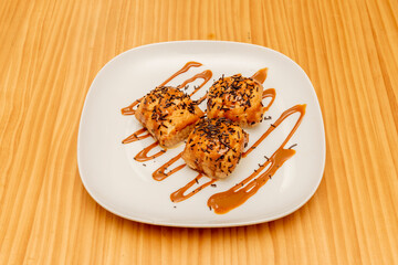 Dulce de tres leches filled cakes with condensed milk syrup and dark chocolate chips