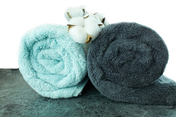 Obraz na płótnie Canvas Flowers composition. Cotton flowers on bath towel background.