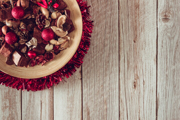 Wooden background with christmas decoration. Copy space. Selective focus.