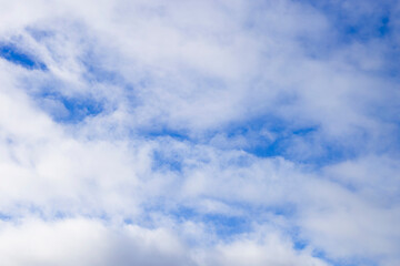 Obraz premium Natural abstract background - blue sky and white clouds.
