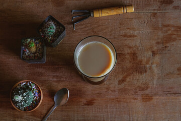 Coffee latte in tall glass, rustic style and refreshment.