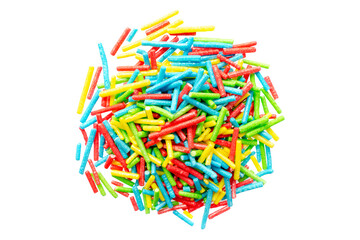 Rainbow sprinkle for confectionery, top view. Colorful confetti on a white background, top view. Confectionery multi-colored sprinkles for decoration. Pile of confectionery sprinkles, top view.
