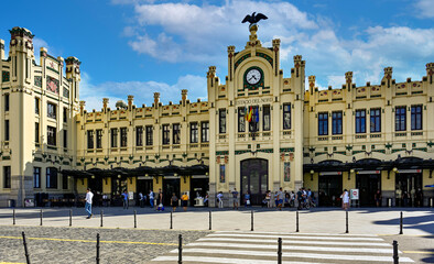 Fototapeta na wymiar Street view of historic train station building in Valencia, Spain.