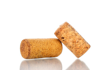 Two wine corks, close-up, isolated on white.