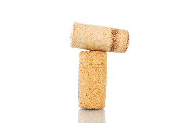 Two wine corks, close-up, isolated on white.