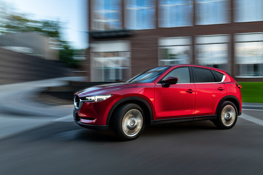 Kyiv, Ukraine - June 30, 2021: Red Mazda CX-5 in motion in the city