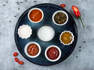 assorted sauces georgian cuisine on gray background