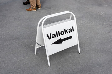 Floor standing sign marked Vallokal meanning polling station.