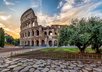 Fototapeta na wymiar Colosseum in Rome (Roma), Italy. The most famous Italian sightseeing on blue sky